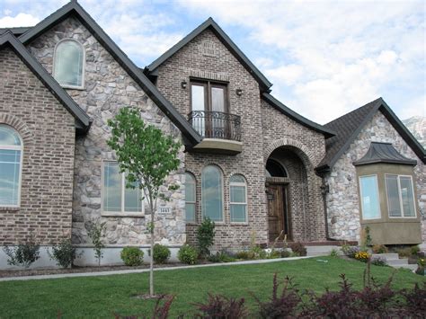 rock brick and metal house exteriors|brick and stone exterior homes.